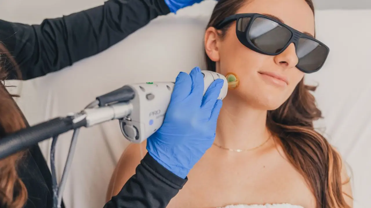 Laser hair removal treatment being performed on a client