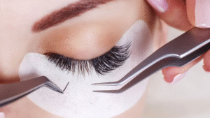 Eyelash extension application using professional beauty tweezers